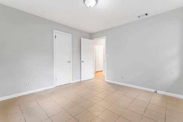 view of tiled spare room