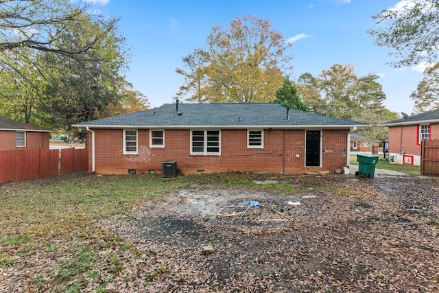 rear view of property featuring central air condition unit