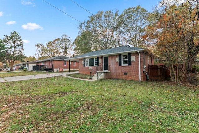 single story home with a front yard