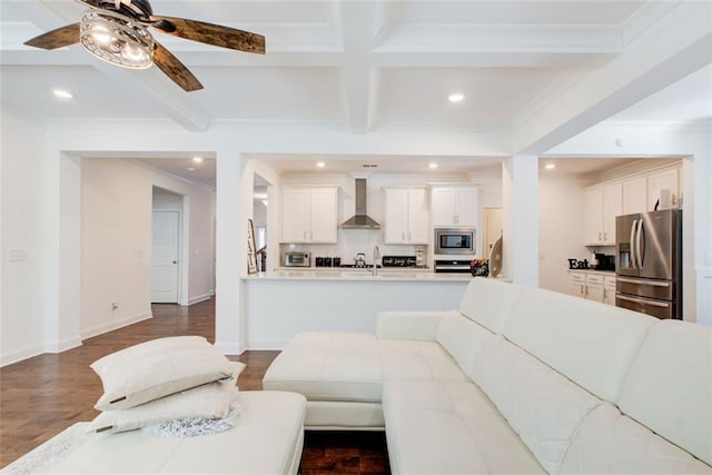 living room featuring coffered ceiling, ceiling fan, beam ceiling, and hardwood / wood-style flooring