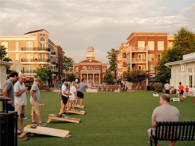 surrounding community featuring a lawn