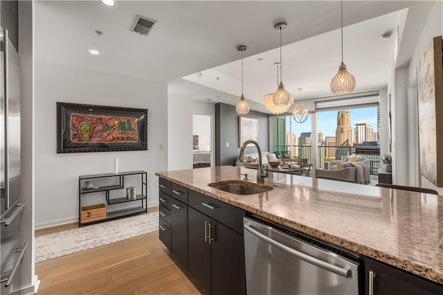 3325 Piedmont Rd NE Unit 2407, Atlanta, GA 30305 - kitchen featuring a sink, light wood finished floors, dishwasher, recessed lighting, and visible vents