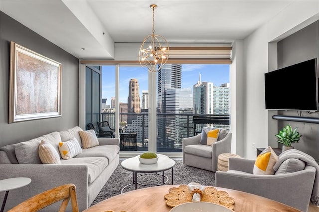 3325 Piedmont Rd NE Unit 2407, Atlanta, GA 30305 - living room featuring wood finished floors, a chandelier, and a wall of windows