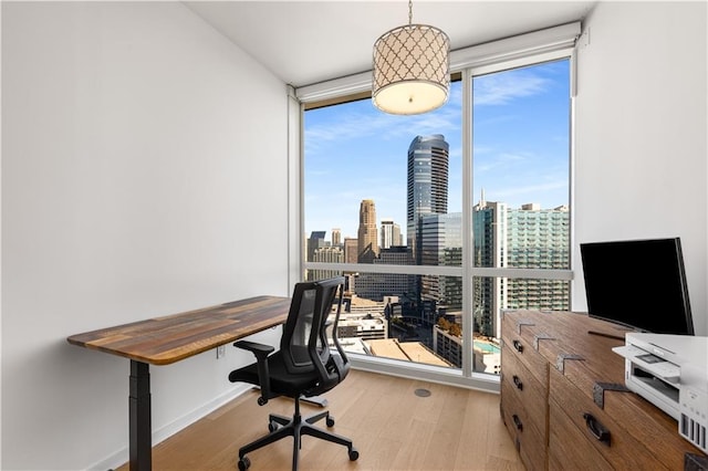 3325 Piedmont Rd NE Unit 2407, Atlanta, GA 30305 - office space with baseboards, floor to ceiling windows, and wood finished floors