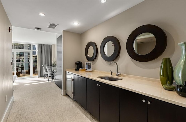 3325 Piedmont Rd NE Unit 2407, Atlanta, GA 30305 - bar featuring visible vents, baseboards, light colored carpet, recessed lighting, and a sink