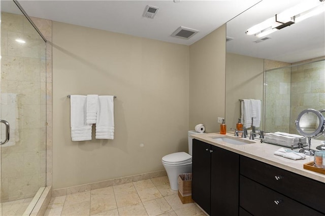 bathroom featuring vanity, toilet, and walk in shower