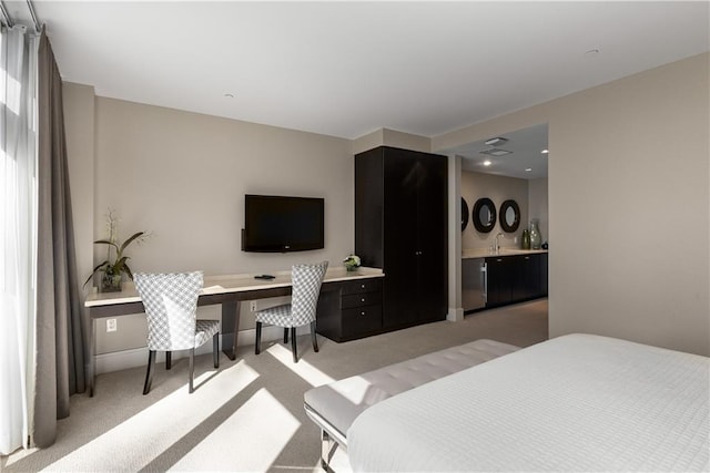 3325 Piedmont Rd NE Unit 2407, Atlanta, GA 30305 - bedroom featuring light colored carpet and a sink