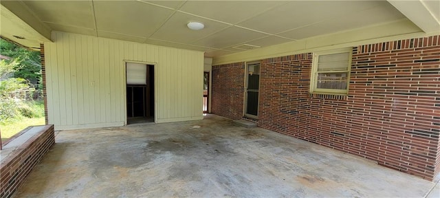 view of patio / terrace with an attached carport