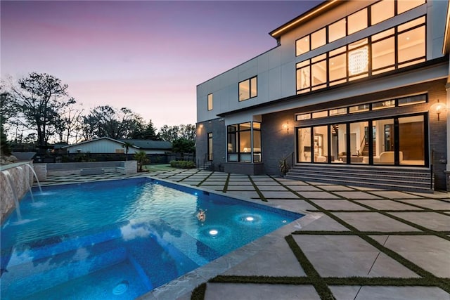 view of pool featuring fence, a fenced in pool, and a patio