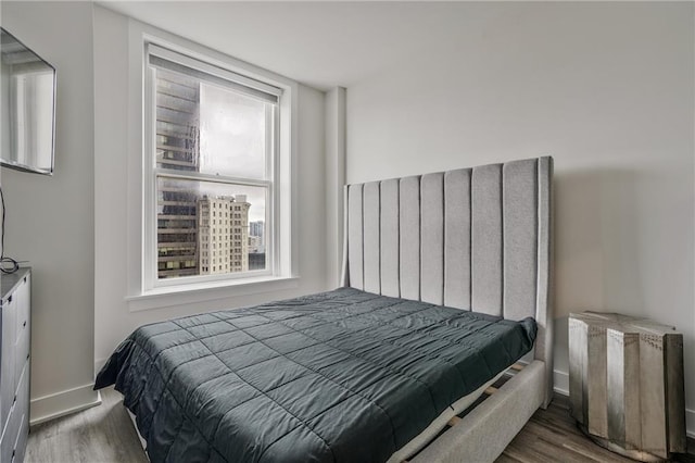 57 Forsyth St NW Unit 14B, Atlanta, GA 30303 - bedroom with wood finished floors and baseboards