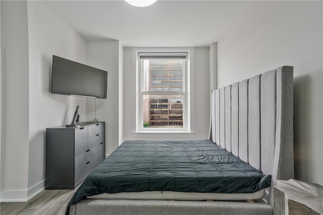57 Forsyth St NW Unit 14B, Atlanta, GA 30303 - bedroom with wood finished floors and baseboards