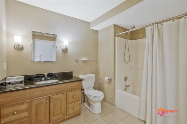 57 Forsyth St NW Unit 14B, Atlanta, GA 30303 - bathroom with tile patterned floors, toilet, vanity, and shower / bathtub combination with curtain