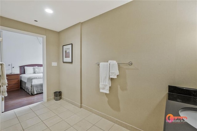 57 Forsyth St NW Unit 14B, Atlanta, GA 30303 - bathroom featuring tile patterned floors, baseboards, and recessed lighting