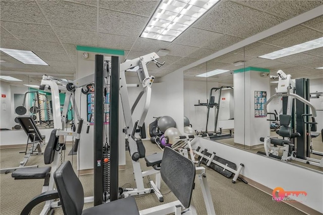 57 Forsyth St NW Unit 14B, Atlanta, GA 30303 - gym featuring a paneled ceiling, carpet floors, and baseboards