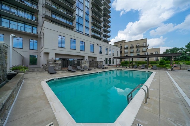 community pool with a patio