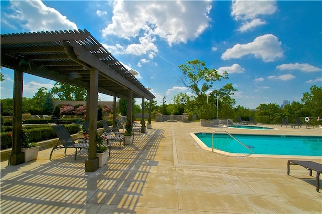 view of pool featuring a jacuzzi, a patio, and a pergola