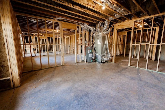 unfinished basement with heating unit and water heater