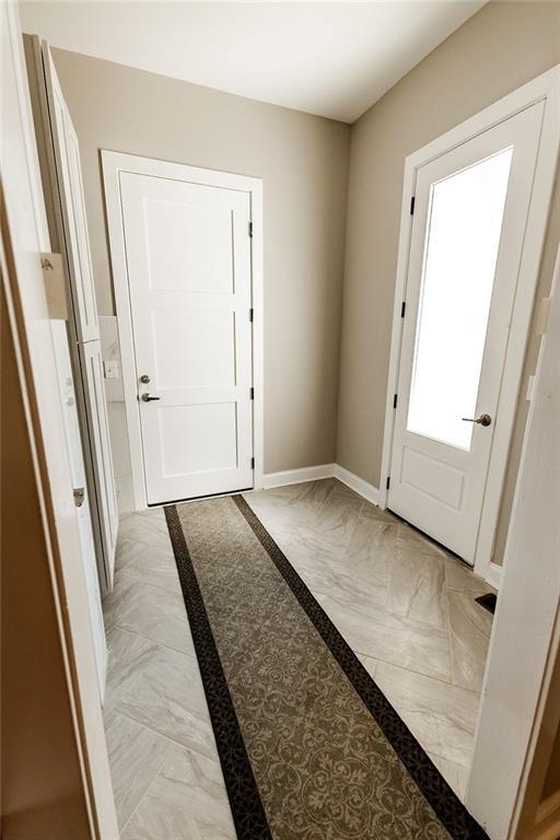 entrance foyer with baseboards