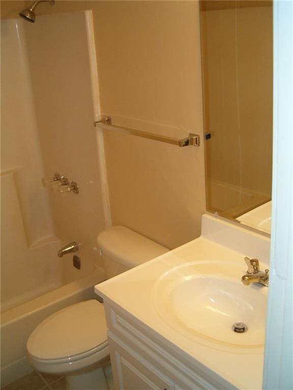 full bathroom featuring vanity, toilet, and shower / tub combination