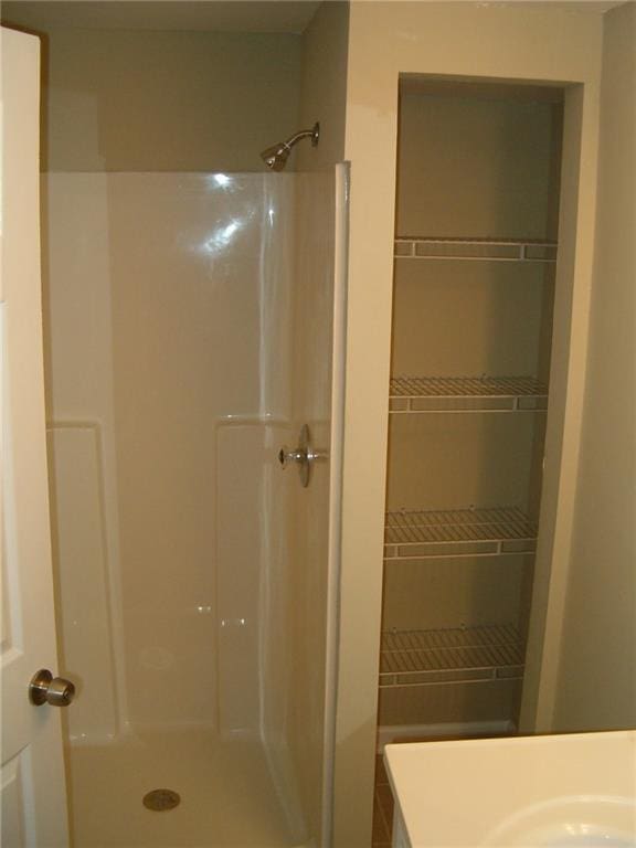 bathroom featuring a shower