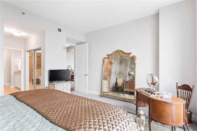 2795 Peachtree Rd NE Unit 2101, Atlanta, GA 30305 - bedroom featuring ensuite bath and baseboards