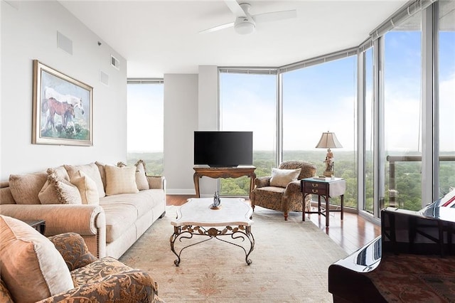 2795 Peachtree Rd NE Unit 2101, Atlanta, GA 30305 - living room featuring a wall of windows, wood finished floors, and ceiling fan