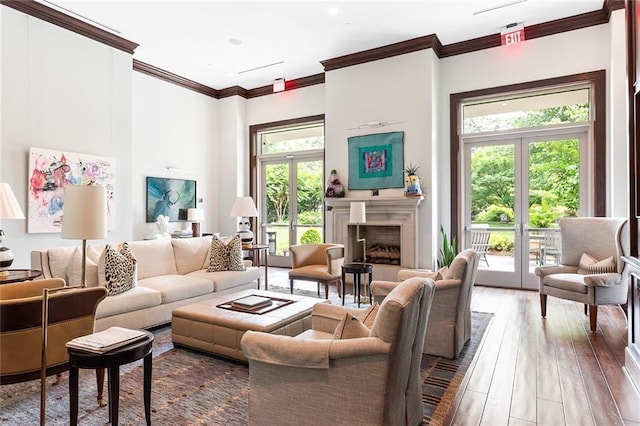 2795 Peachtree Rd NE Unit 2101, Atlanta, GA 30305 - living room featuring ornamental molding, hardwood / wood-style flooring, and a fireplace