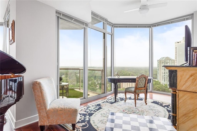 2795 Peachtree Rd NE Unit 2101, Atlanta, GA 30305 - sunroom featuring a wall of windows, wood finished floors, and baseboards