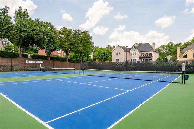 view of sport court with fence and community basketball court