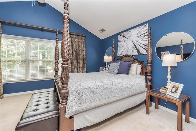 carpeted bedroom with ceiling fan and lofted ceiling