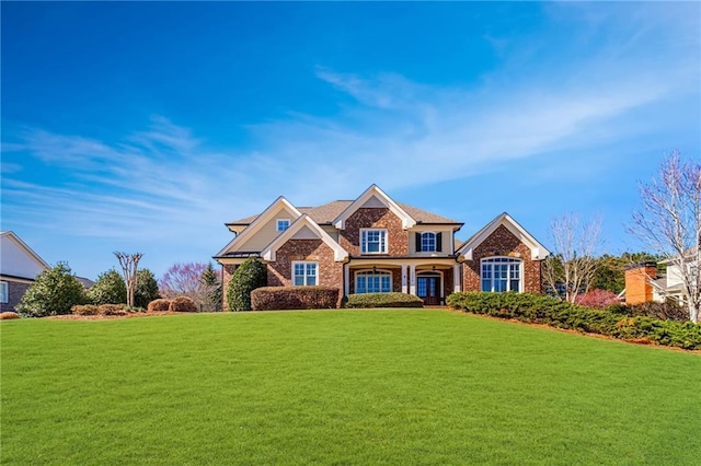 view of front of property featuring a front yard