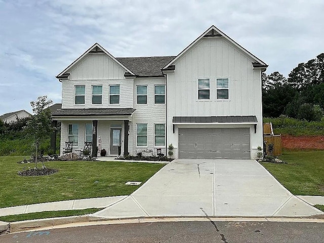 view of front of house featuring concrete driveway, an attached garage, a front lawn, a porch, and board and batten siding