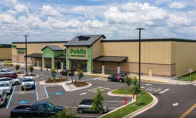 817 Dobby Way, Mcdonough, GA 30252 - view of commercial property with uncovered parking