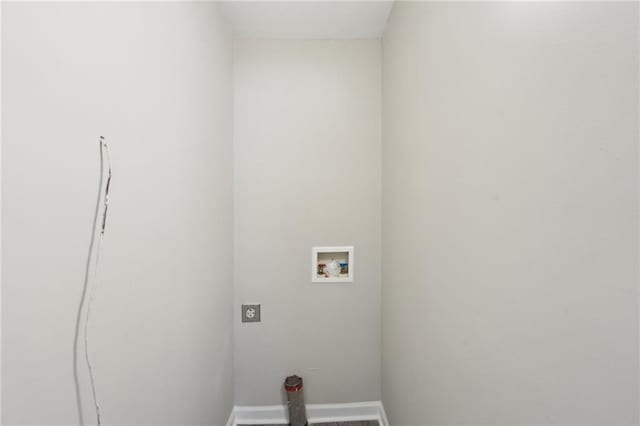 washroom with hookup for a washing machine, baseboards, and electric dryer hookup