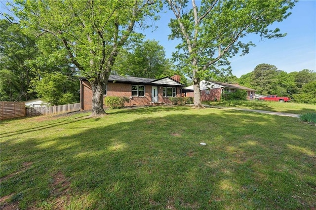 ranch-style home with a chimney