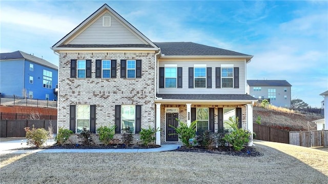 4825 Odum View Ln, Cumming, GA 30040 - view of front facade featuring brick siding and a porch