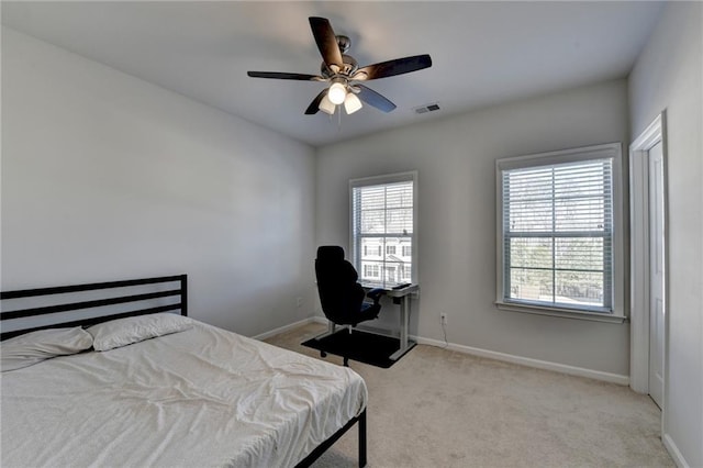 4825 Odum View Ln, Cumming, GA 30040 - bedroom featuring multiple windows, light carpet, baseboards, and a ceiling fan