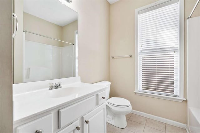 full bathroom with toilet, vanity, baseboards, a shower, and tile patterned floors