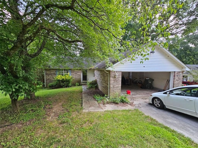 12 Lakemont Dr SE, Silver Creek, GA 30173 - single story home with brick siding, concrete driveway, a garage, and a front lawn