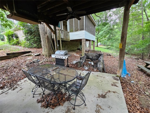 12 Lakemont Dr SE, Silver Creek, GA 30173 - view of patio / terrace with a sunroom, area for grilling, and outdoor dining space