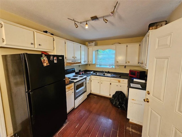 12 Lakemont Dr SE, Silver Creek, GA 30173 - kitchen with freestanding refrigerator, electric range, a sink, under cabinet range hood, and dark countertops