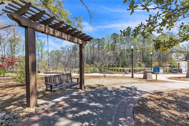 surrounding community featuring a pergola