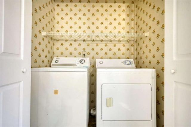 laundry room with separate washer and dryer