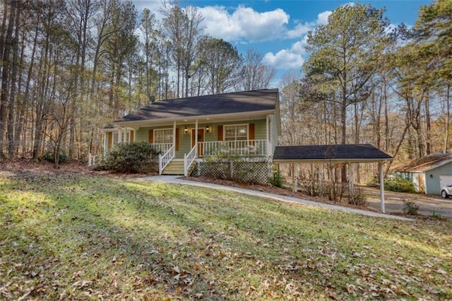 view of front of home with covered porch and a front lawn