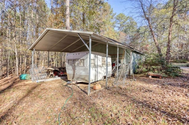 view of outdoor structure with a carport