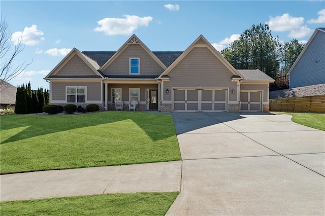 craftsman-style house with a garage and a front yard