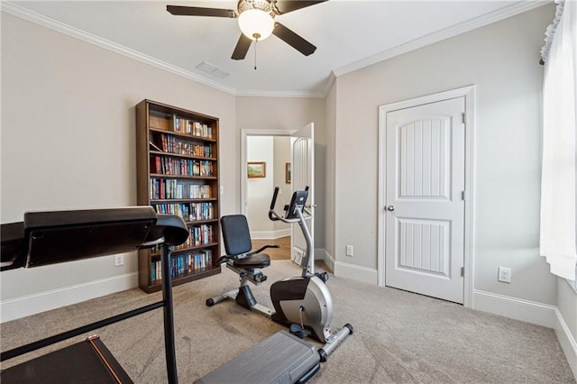 workout room with light carpet, crown molding, and ceiling fan