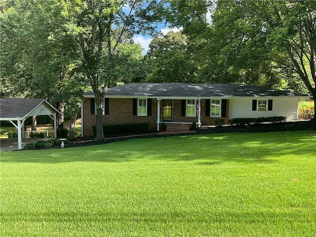 ranch-style house with a front lawn