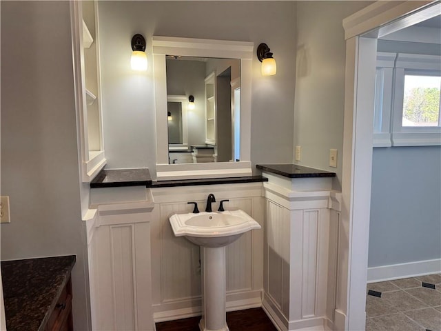 bathroom featuring baseboards