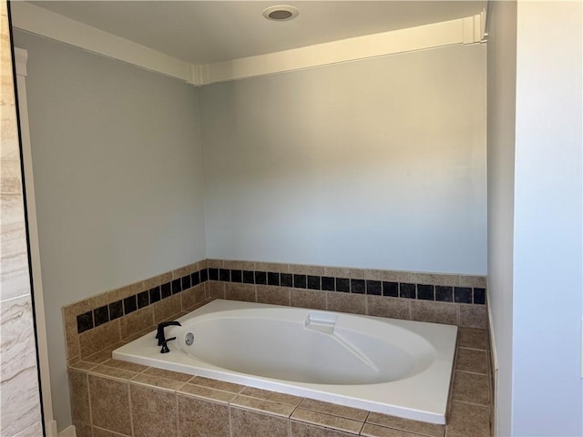 bathroom featuring a garden tub